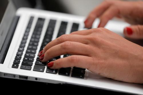 A person types on a laptop computer in Manhattan, New York City, U.S., on September 11, 2020.